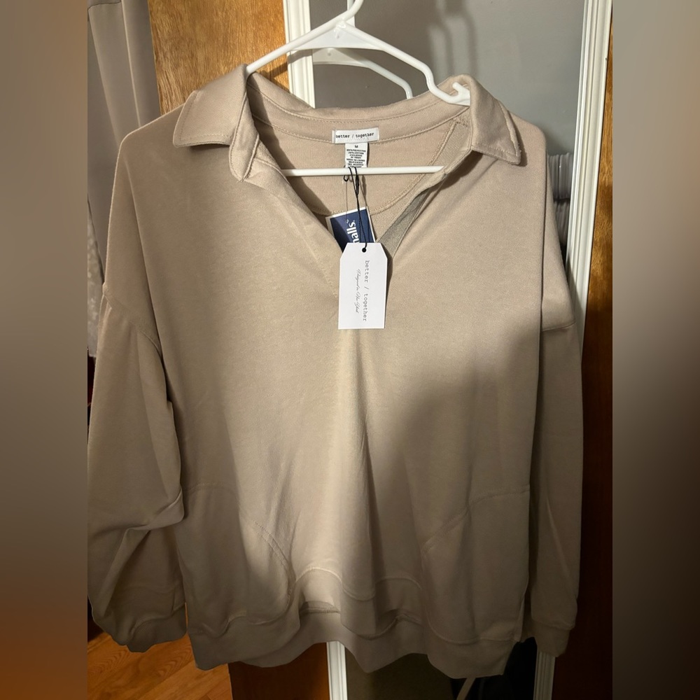 Women’s tan shirt